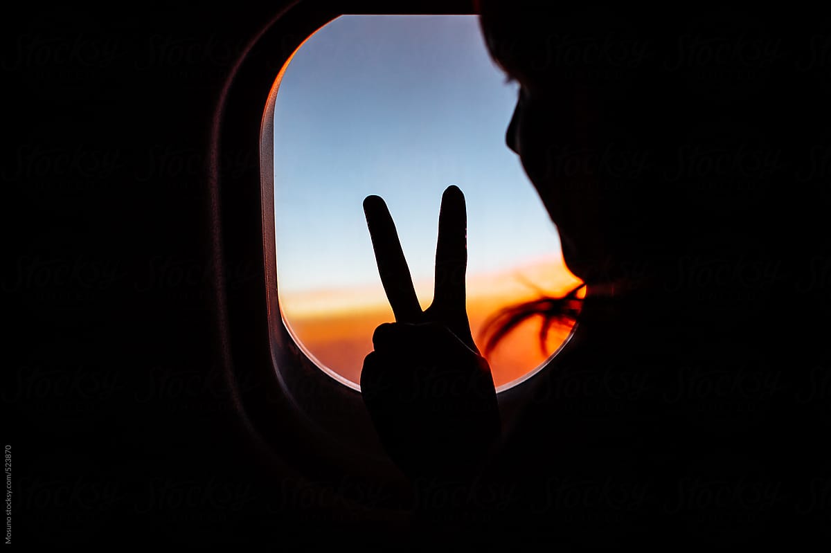 Silhouette Of A Hand Showing Peace Sign By Stocksy Contributor