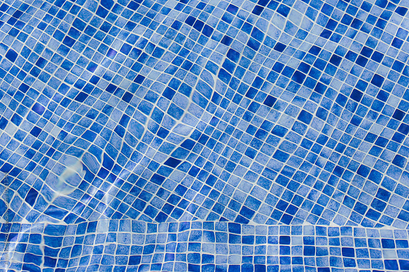 Colorful blue mosaic tiles in a swimming pool