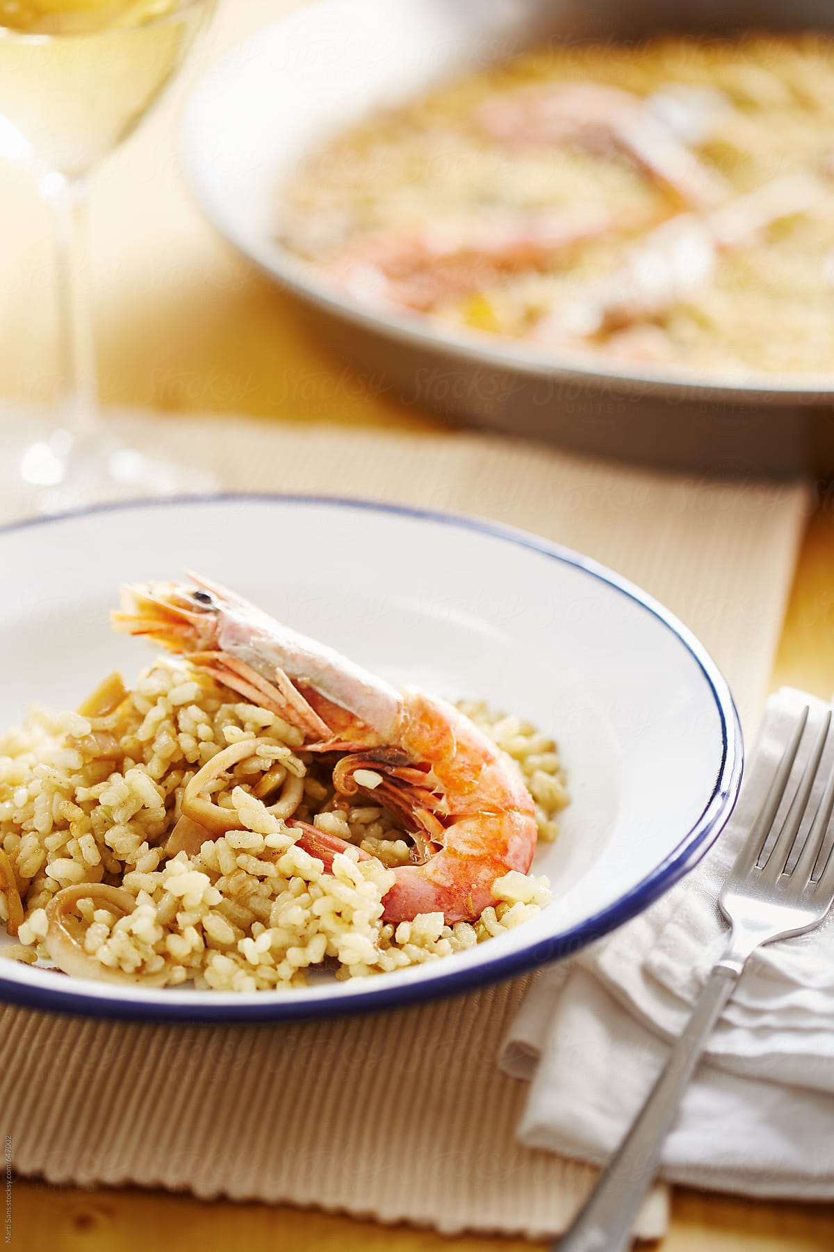Typical Spanish paella and fork