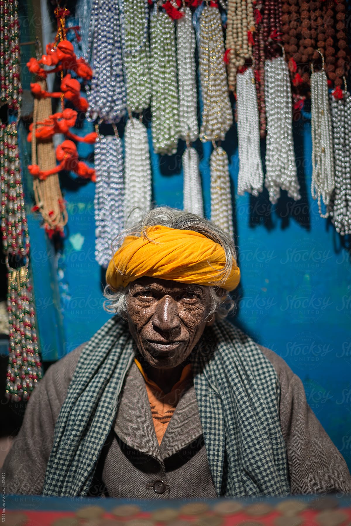 Old Indian man in his shoop