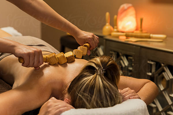Unknown Caucasian woman having madero therapy massage anti