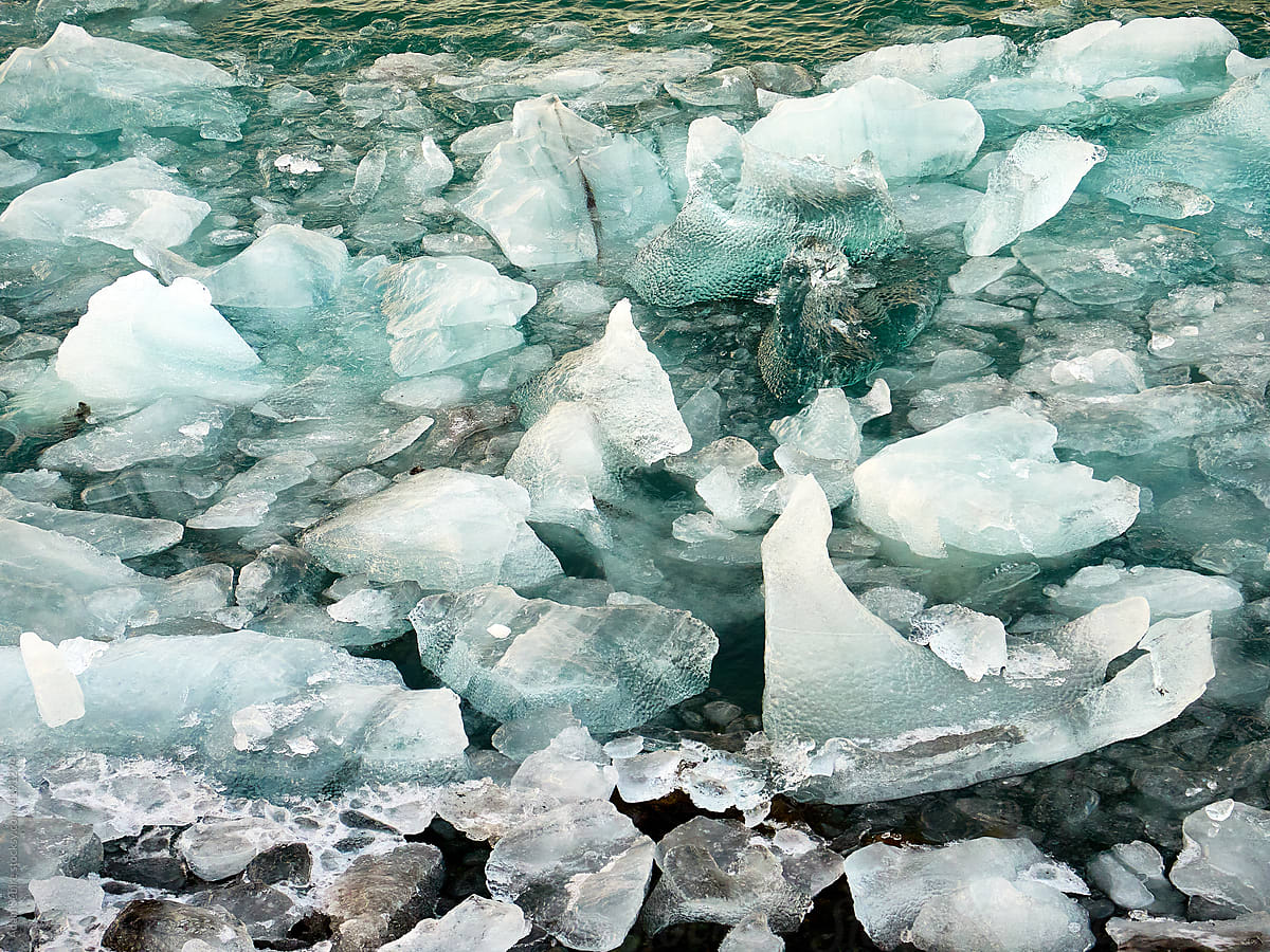 Bergy bits of ice, small fragments thawing in Arctic