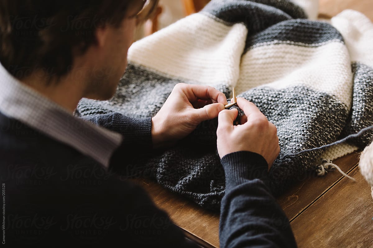 Man knitting a blanket