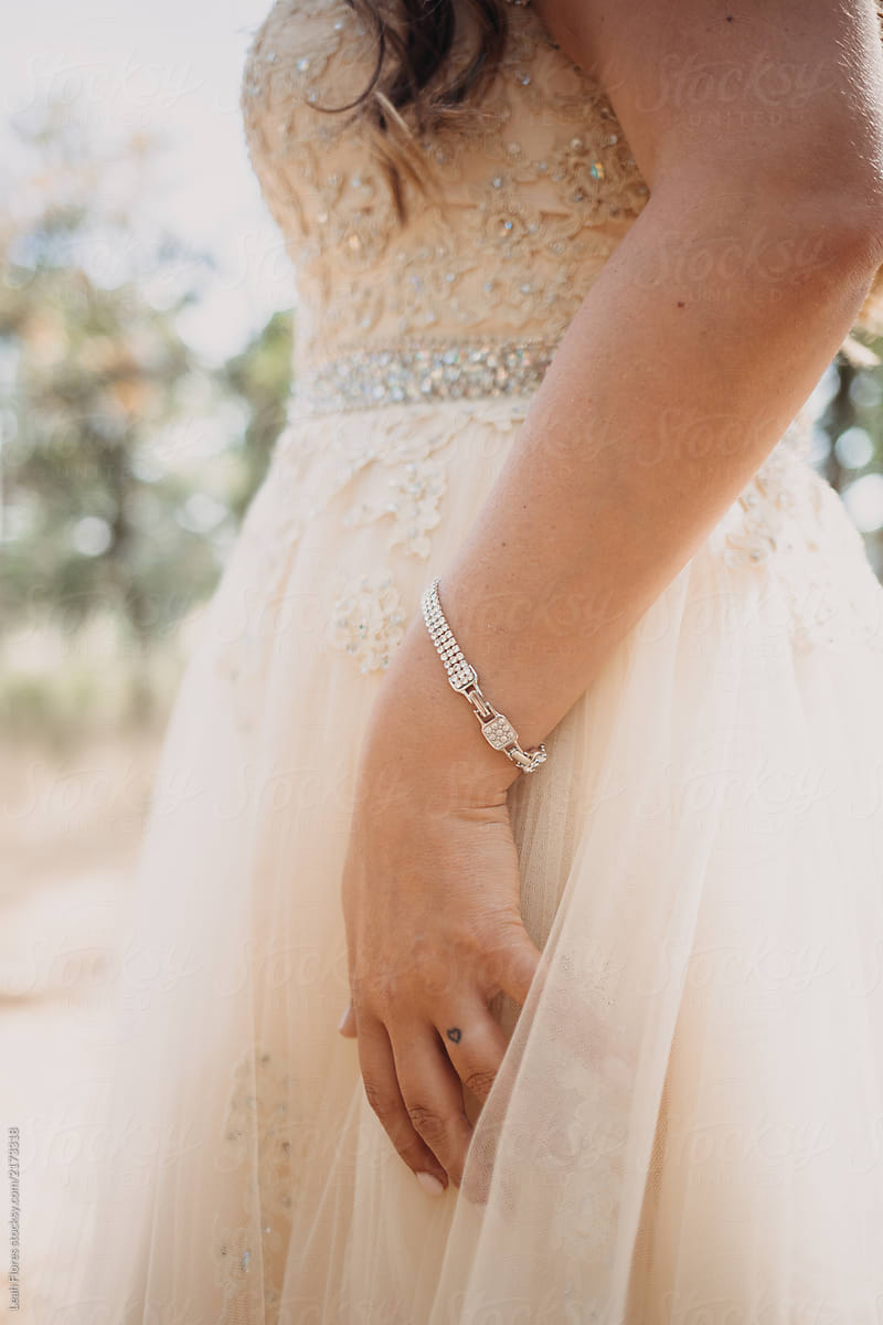 Closeup of Bride\'s Ring Tattoo and Bracelet
