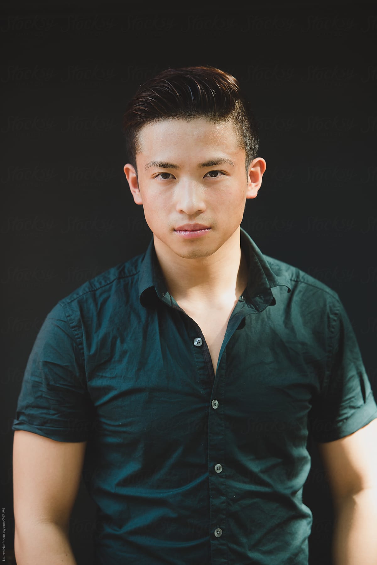 Portrait of young Asian man