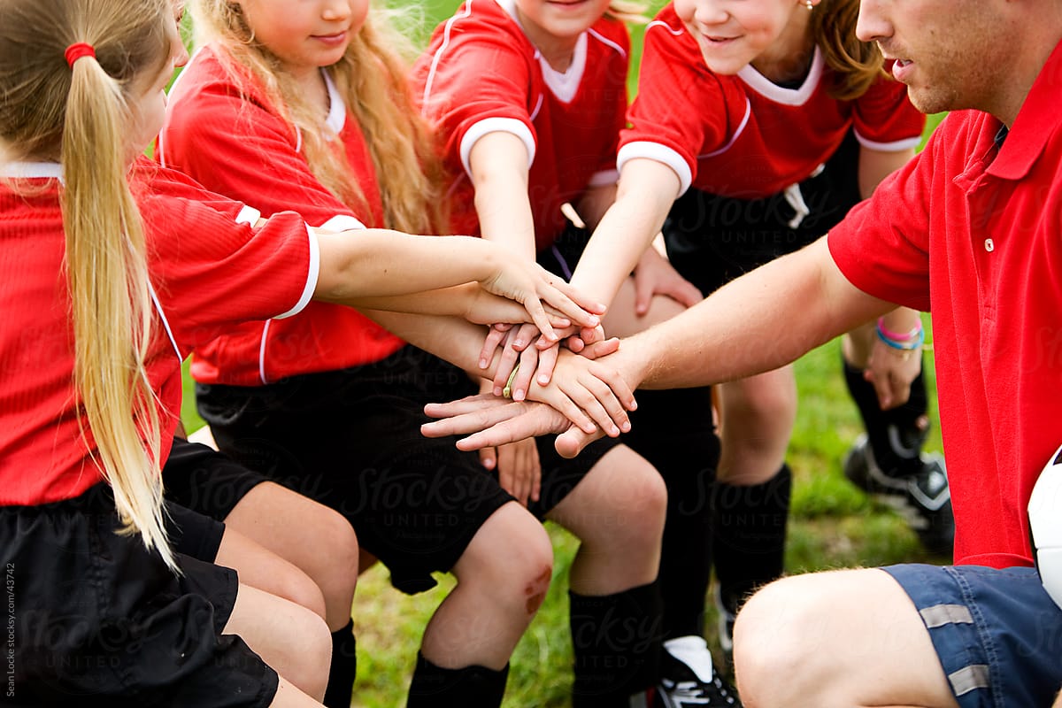 Soccer: Players Put Hands Together