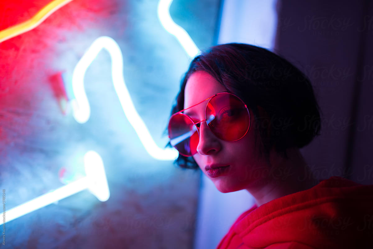 portrait of young asian woman with neon light