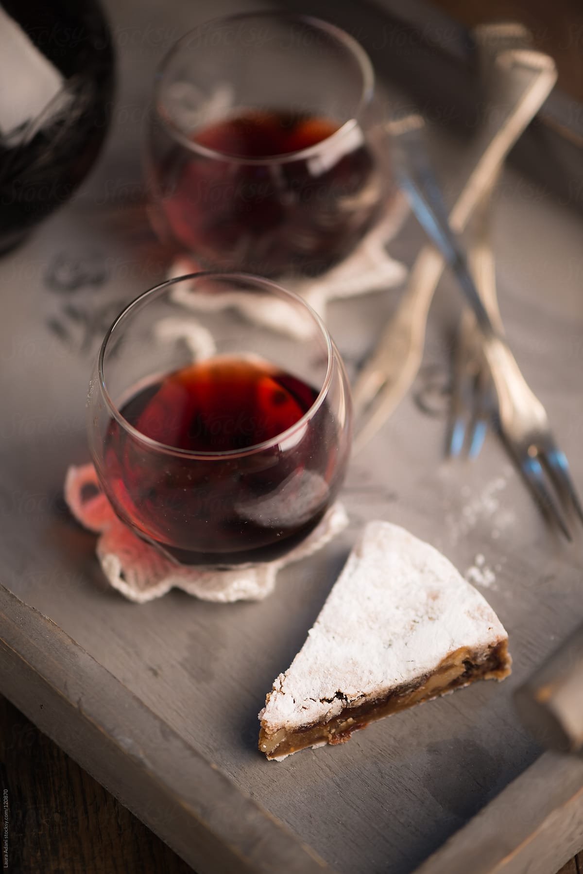 a slice of Panforte and a glass of marsala wine
