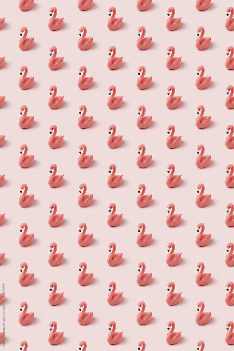 Easter seamless pattern of pink toy flamingos