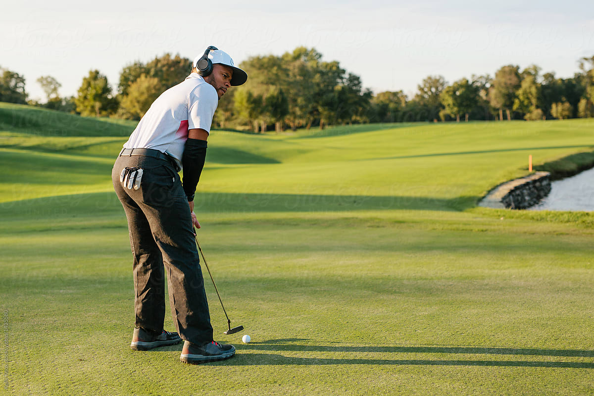 man putting while listening to music to stay focused