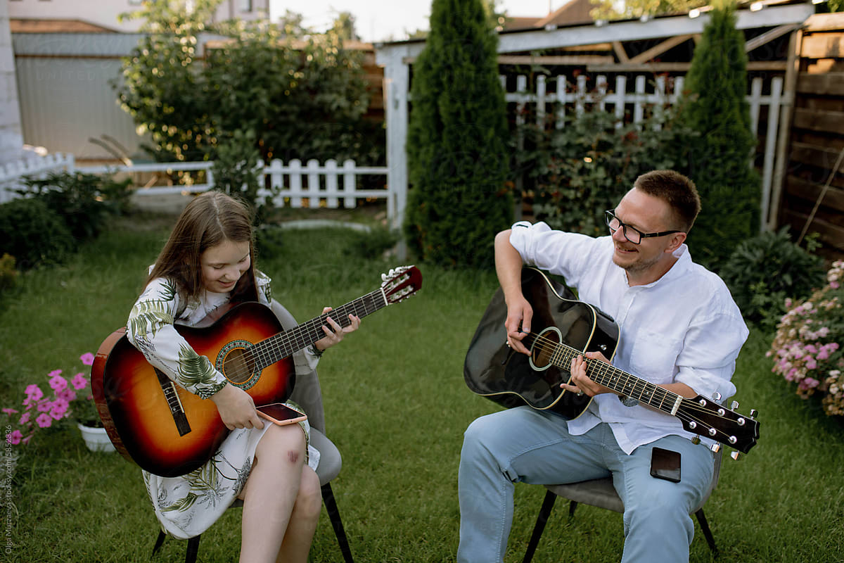 guitar lesson in the yard