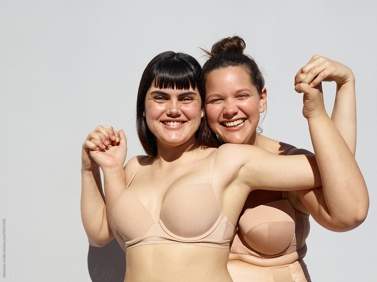 Joyful Women In Their Underwear by Stocksy Contributor Ohlamour