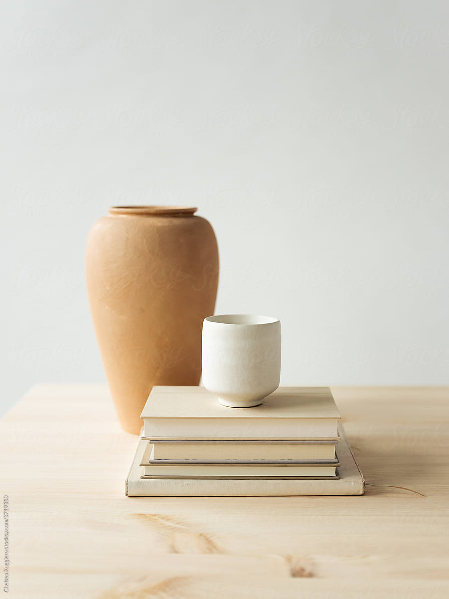 Minimal Table Scene with Pottery and Books