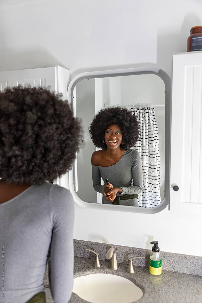 Black Lifestyle Girl  bathroom mirror reflection with big smile