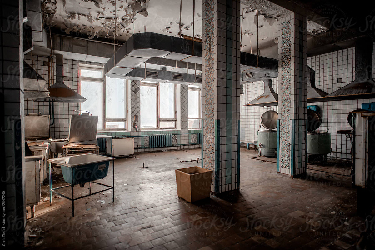 Old shabby kitchen in abandoned building