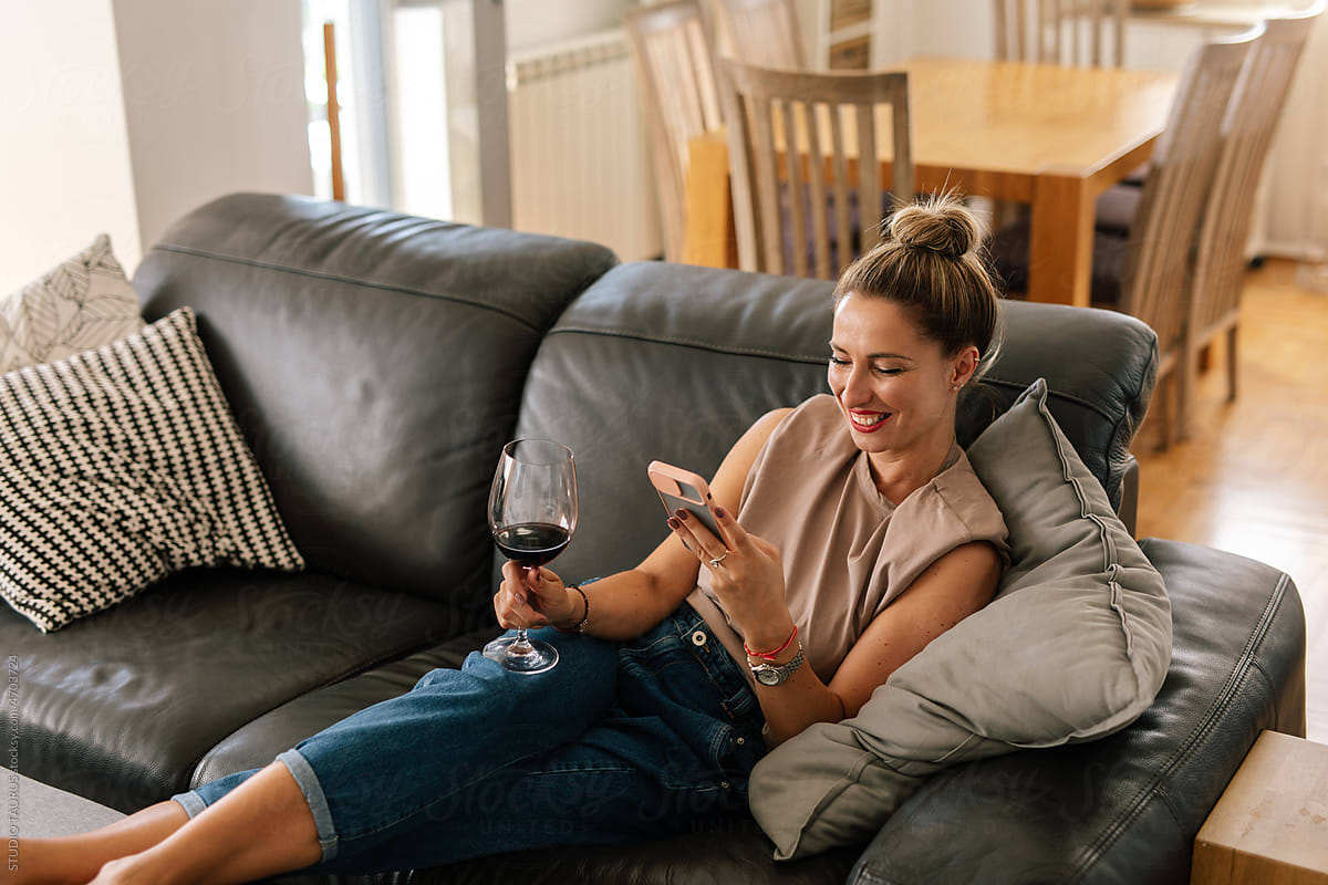 Woman Relaxing On The Sofa At Home