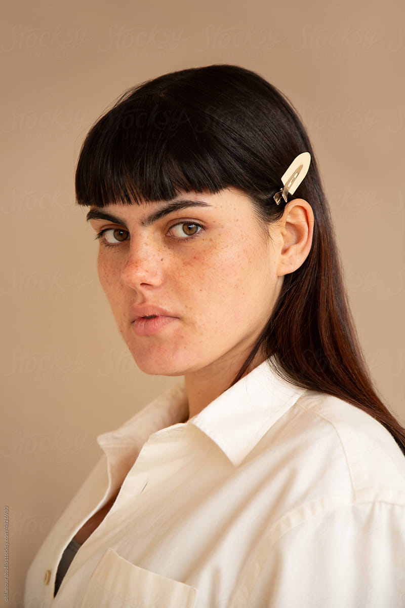 Strong woman wearing a hair clip