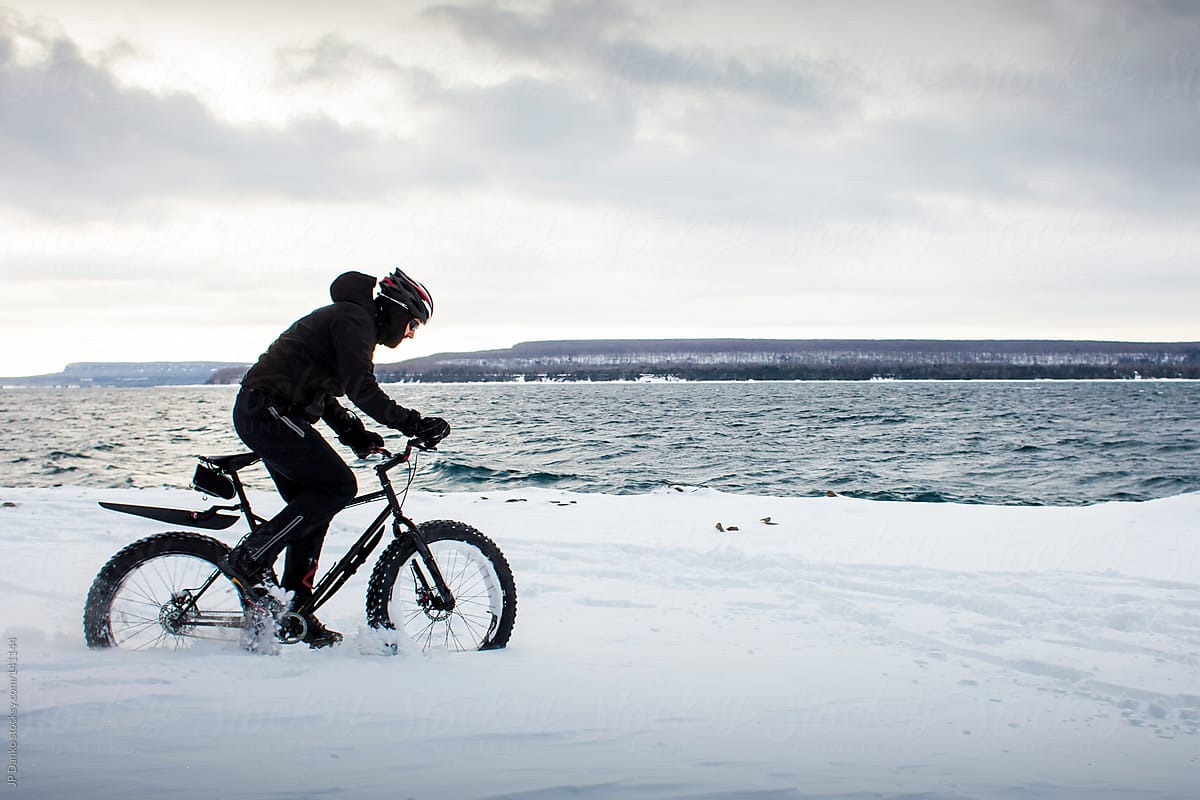 Extreme Sport Winter Mountain Biking with Fat Bike In Snow