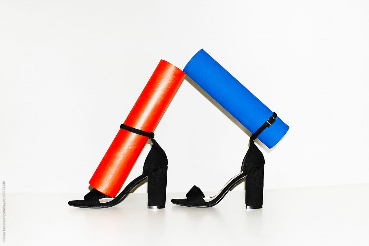 Black classic suede heels and colorful tubes with hard direct flash