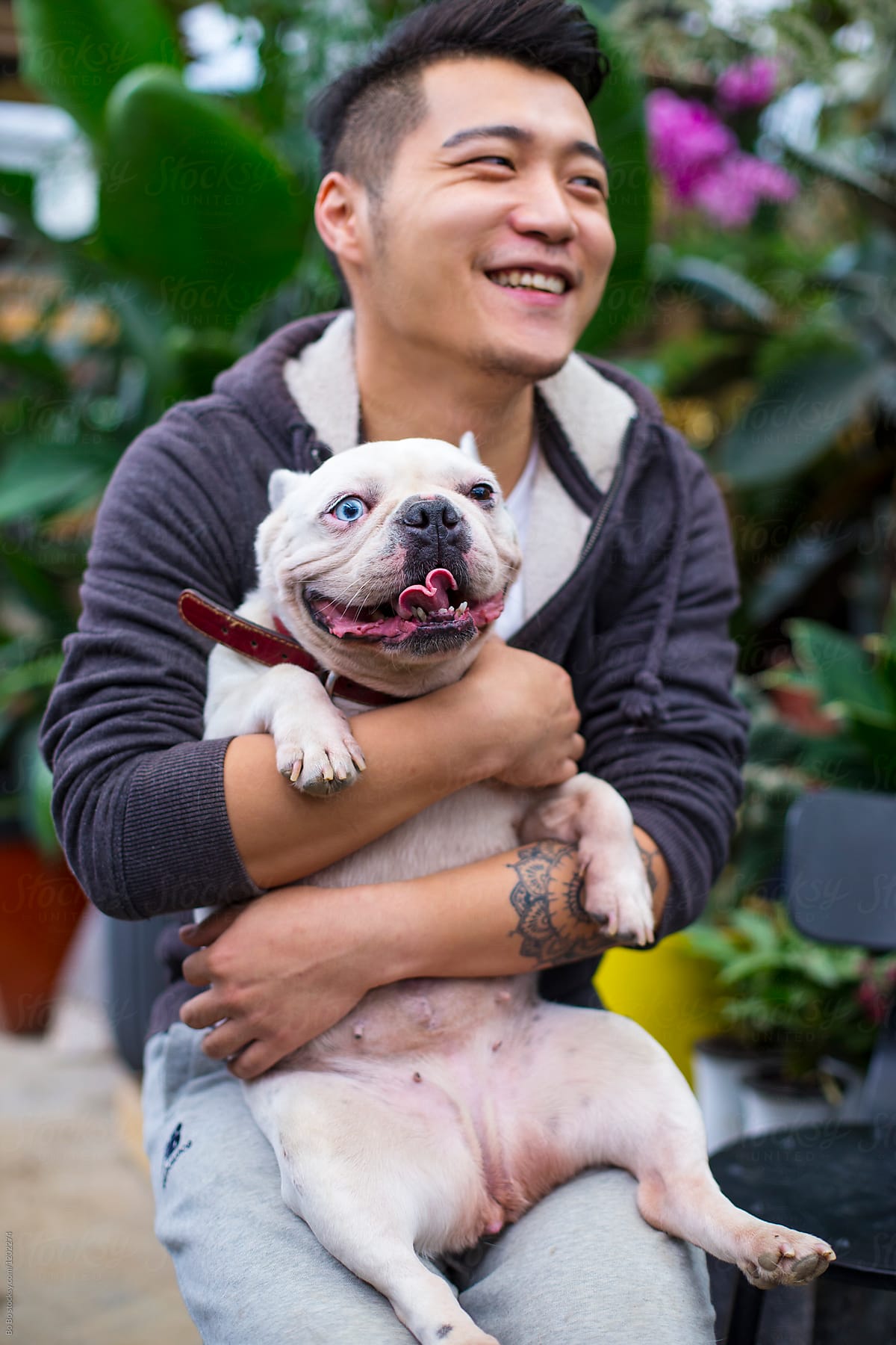 One Young Asian Man with his Dog