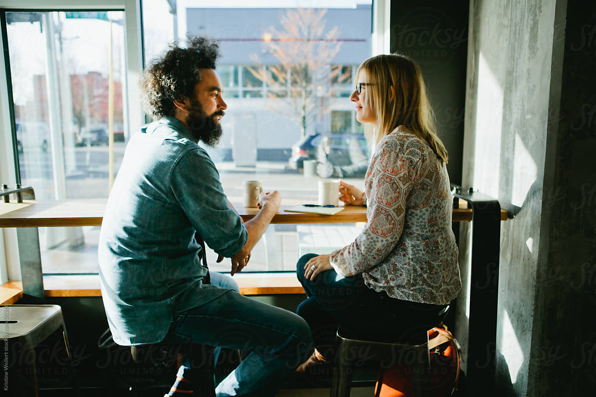 Man and Woman meeting over Coffee