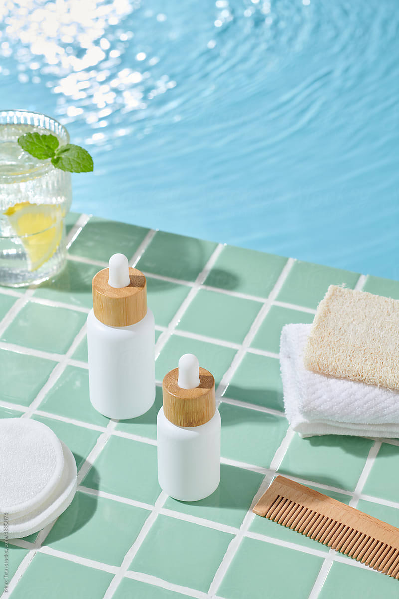 Presentation of organic eco-friendly spa beauty products near pool