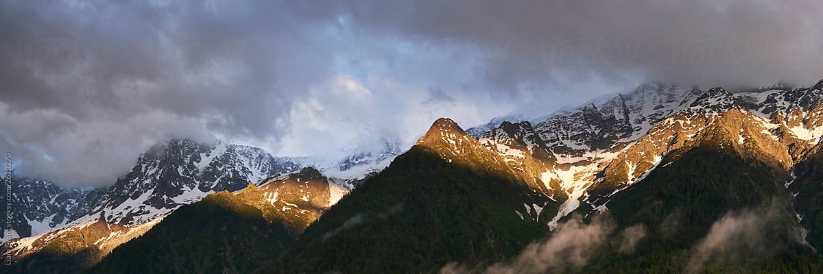 Dramatic clouds at sunset over Aiguille du Midi and Mont Blanc. Chamonix, France.