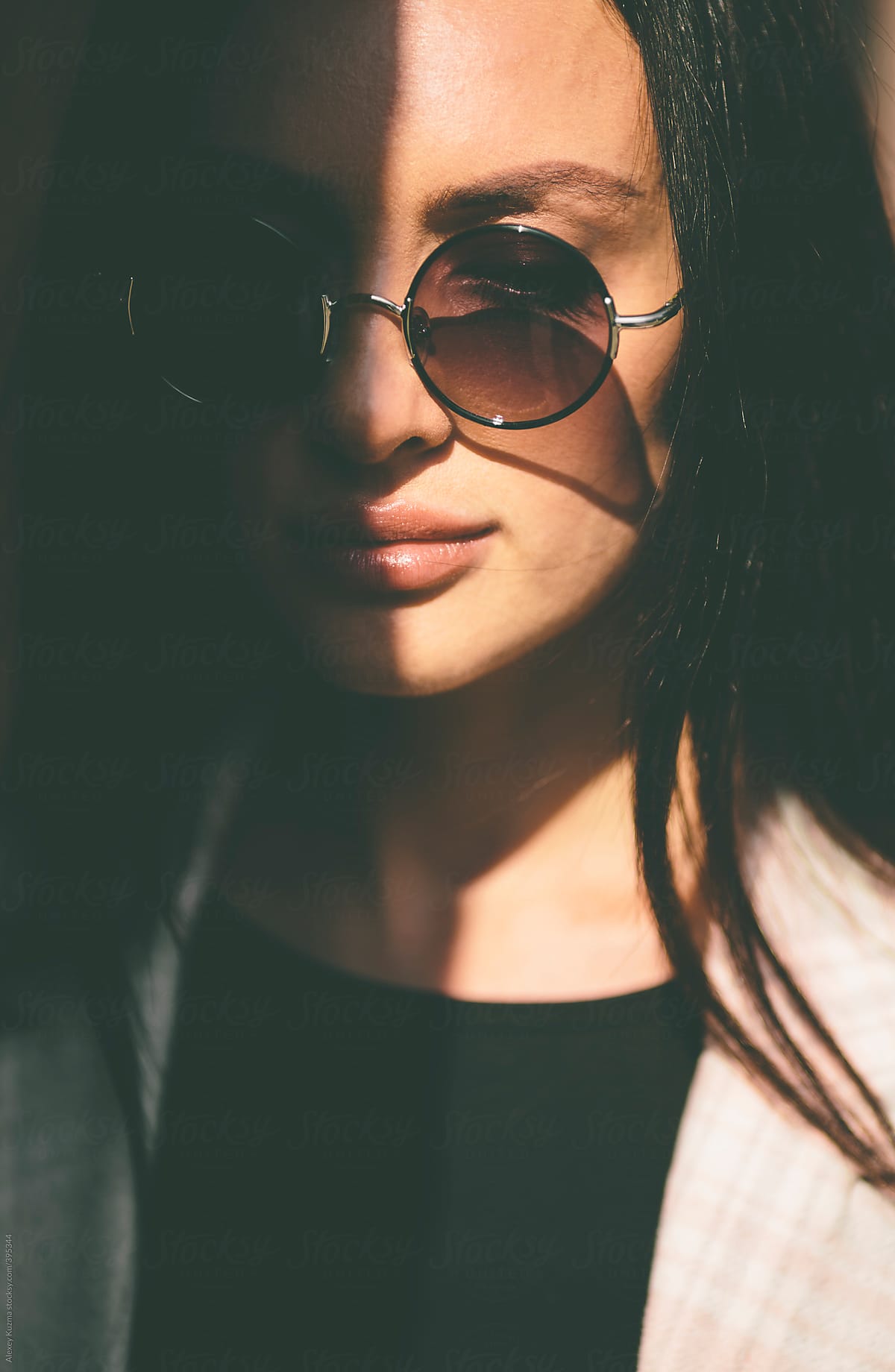 Portrait Of Trendy Woman With Round Sunglasses In Closeup By Stocksy Contributor Alexey