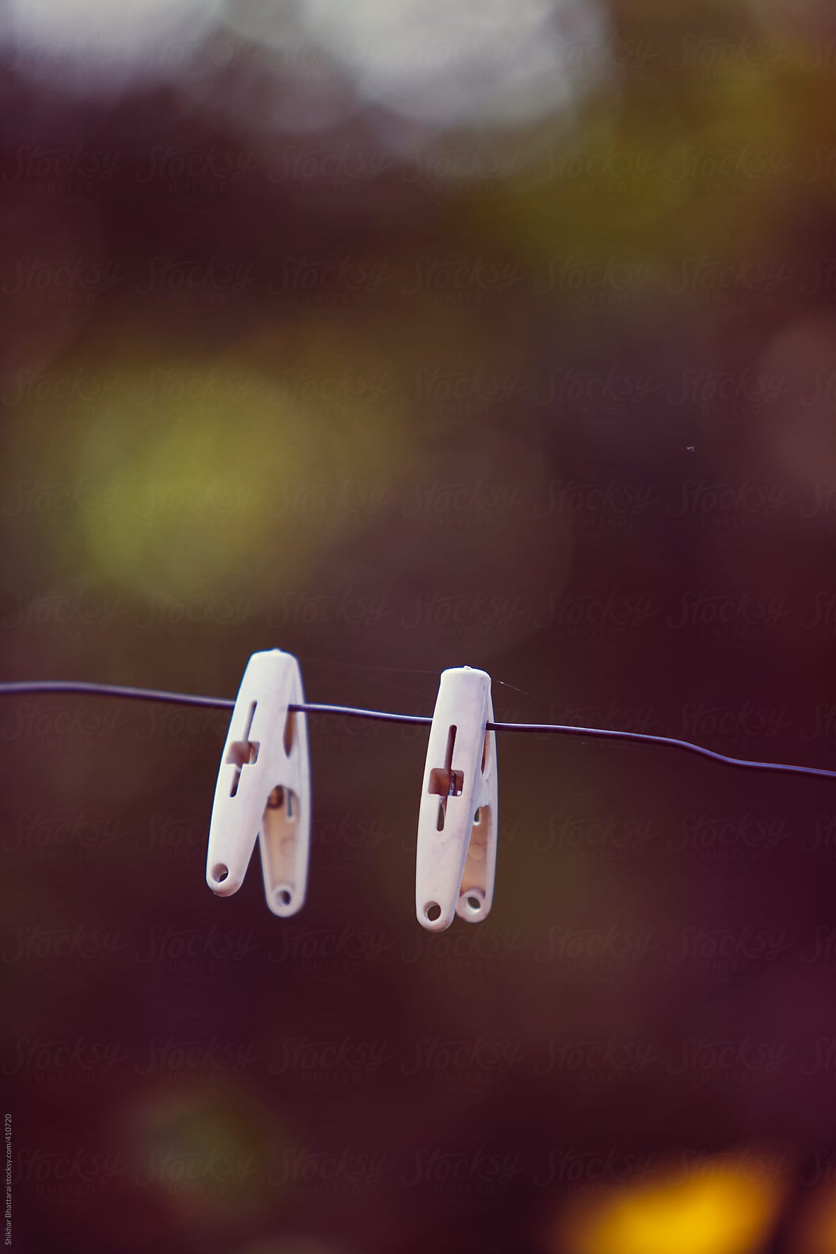 Pegs hanging on a clothes-line, eco-friendly laundry.