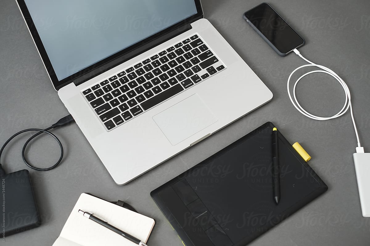 Laptop And Graphic Tablet On The Grey Background