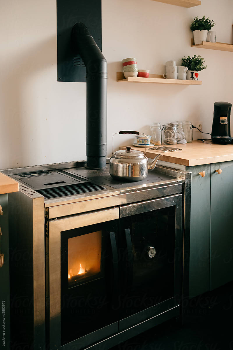 modern farmhouse kitchen with wood stove