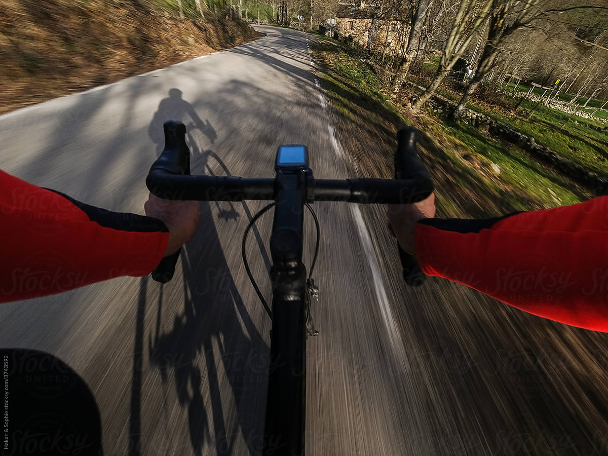 point of view: athlete on a road bike downhill