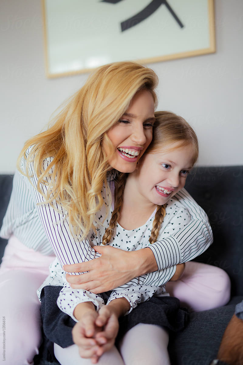 Mom Hugging Her Daughter By Stocksy Contributor Lumina Stocksy 