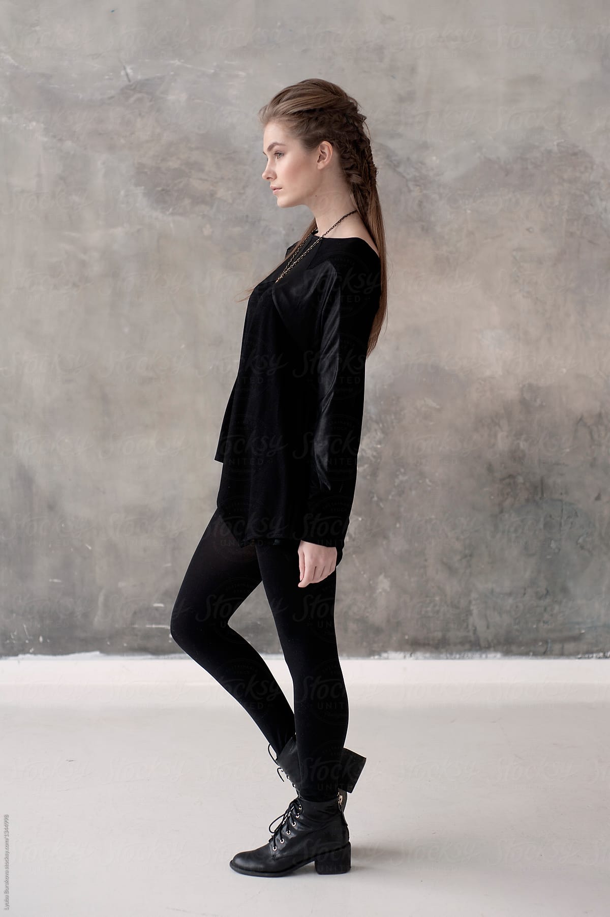 Young woman wearing black stylish outfit