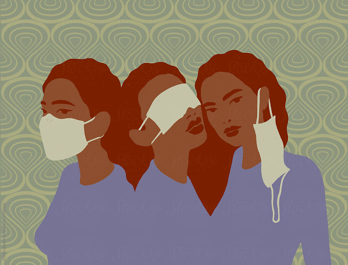 Three girls in medical masks.