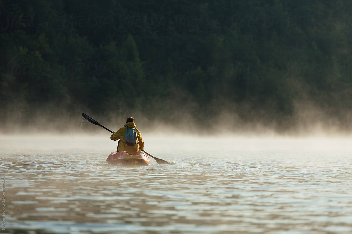 Man paddling in a canoe