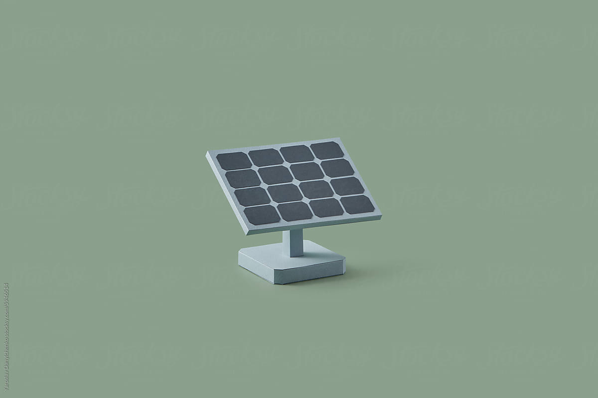 Cardboard solar panel located on olive studio background