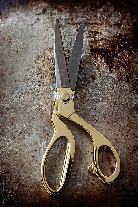 A pair of gold scissors by Sandra Cunningham - Stocksy United