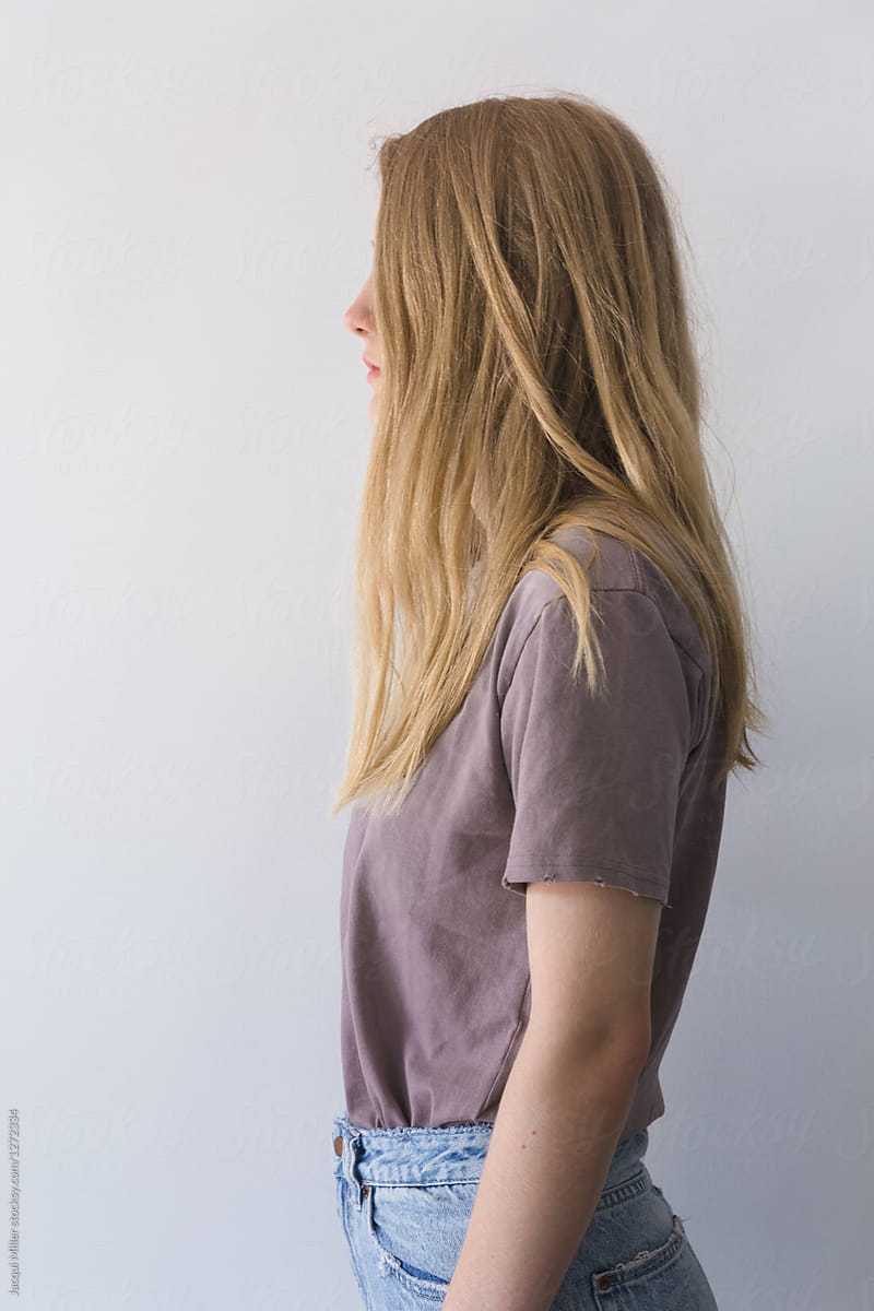 Side View Of Teen Girl With Messy Blonde Hair By Jacqui Miller 