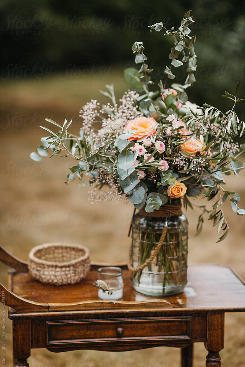 small rustic table with flowers