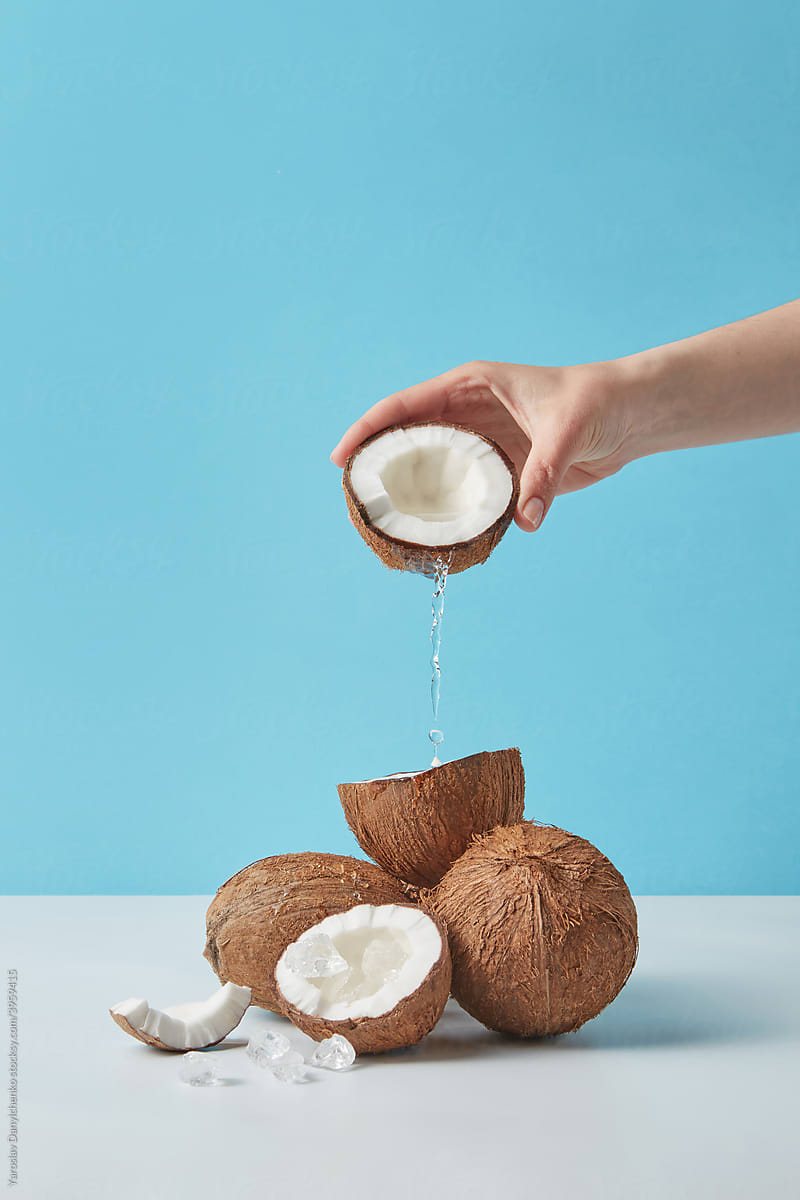 Woman pouring coconut water