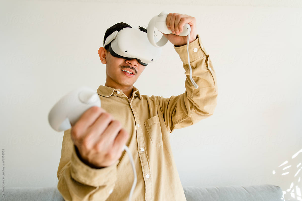Asian Man Playing VR