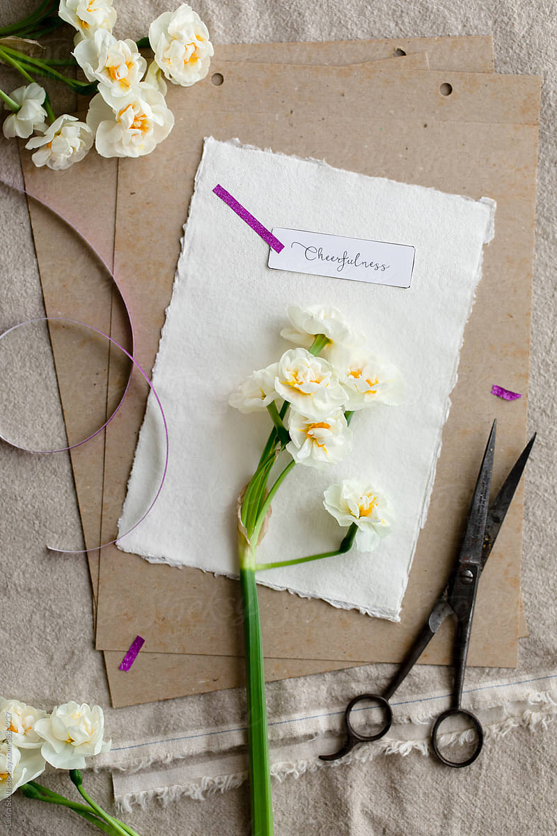 Papers and flowers with name label