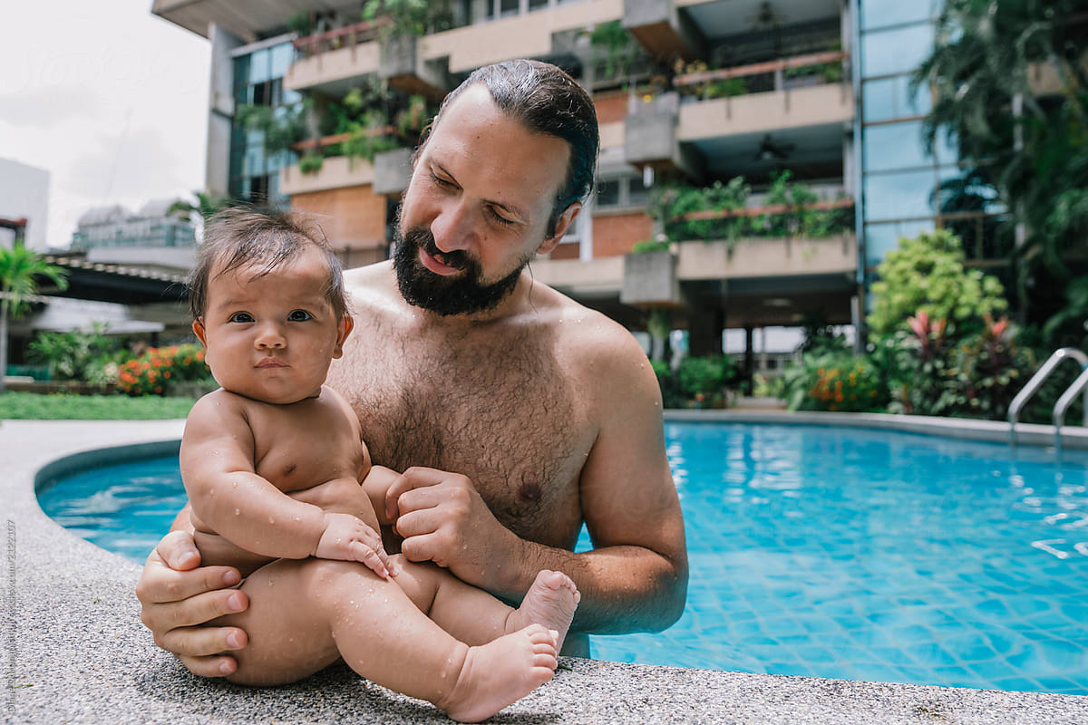 Father and Baby Poolside