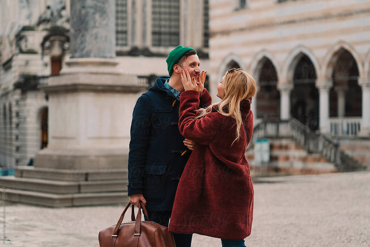A couple having fun in the city during winter