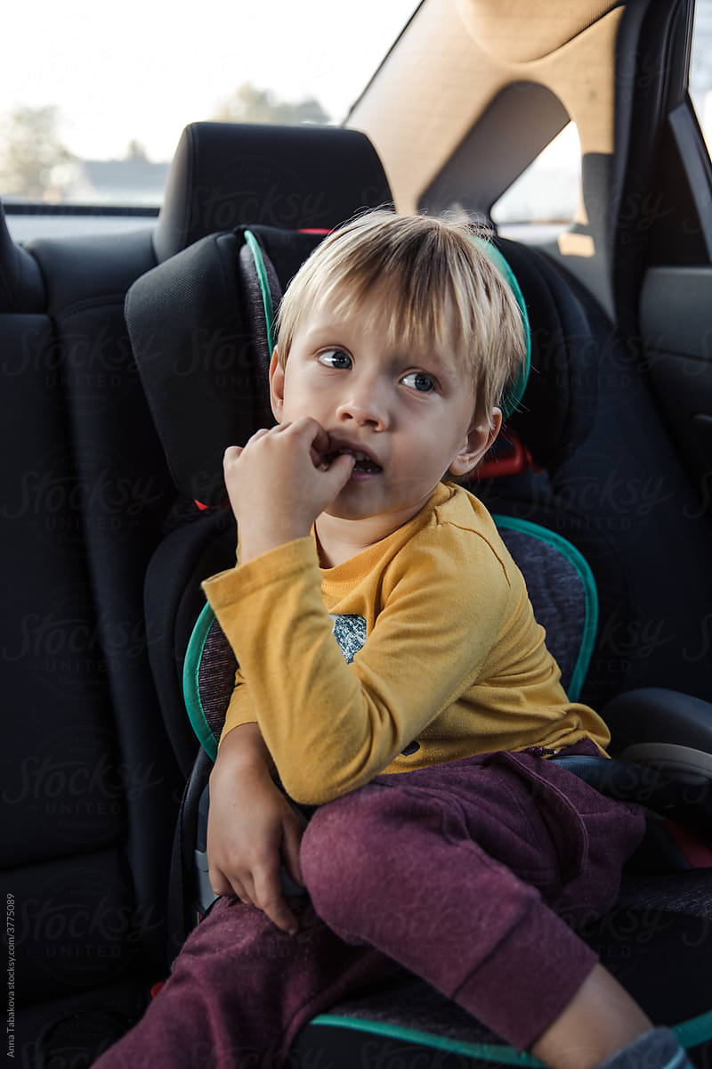 Boy sitting in a car seat