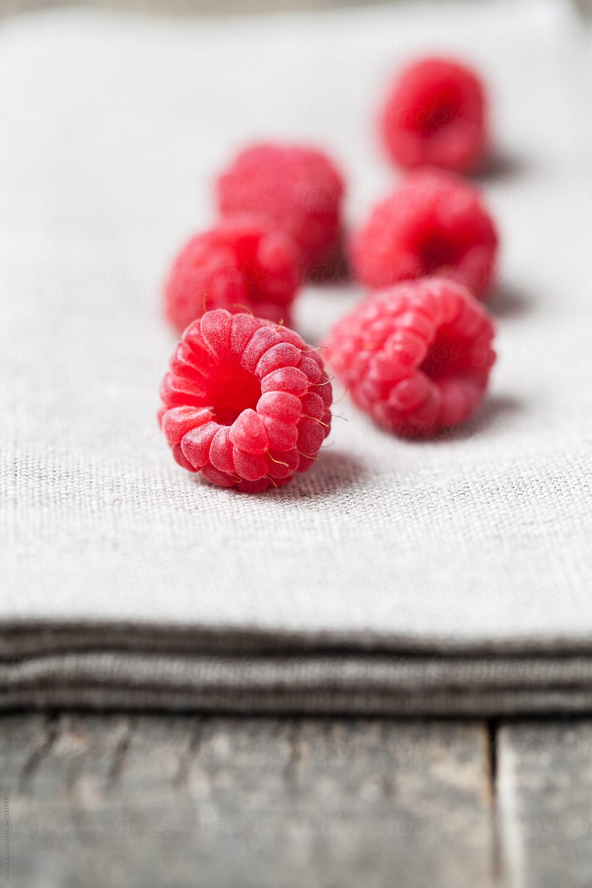 Fresh Raspberries On The  table