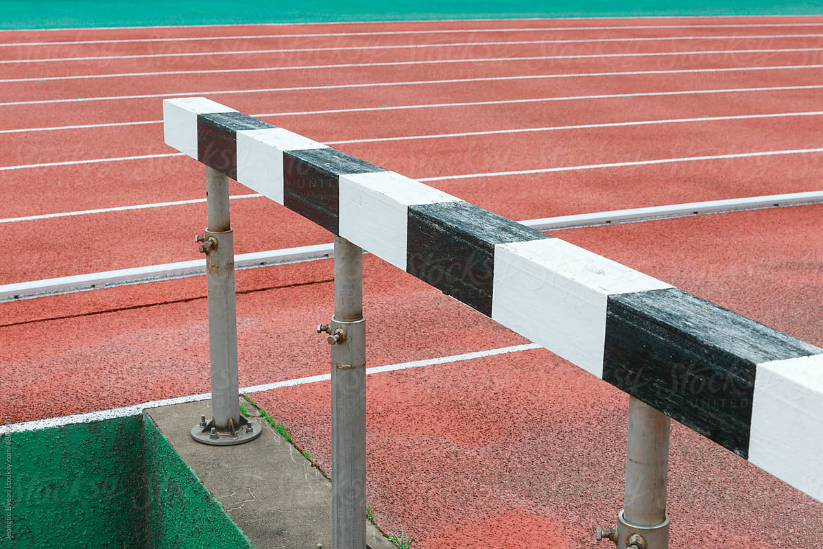 Close-up of stadium tracks and hurdles.
