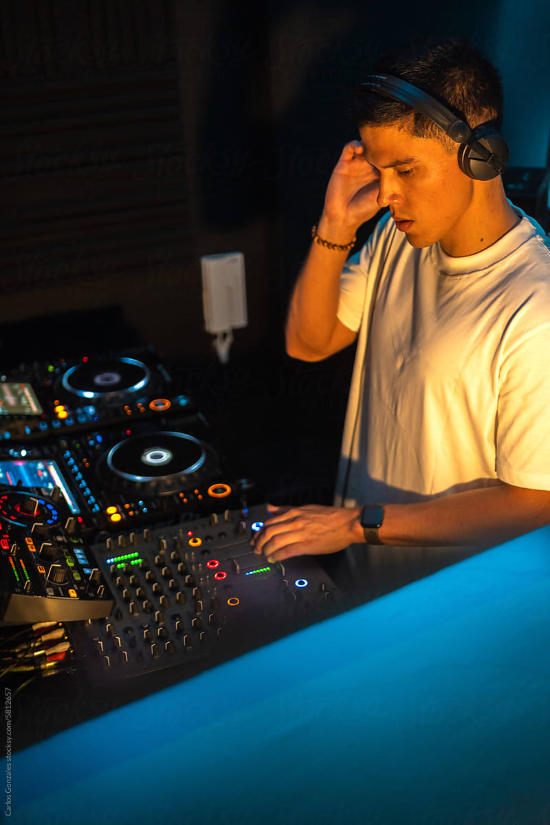 DJ in Studio with Blue Lights