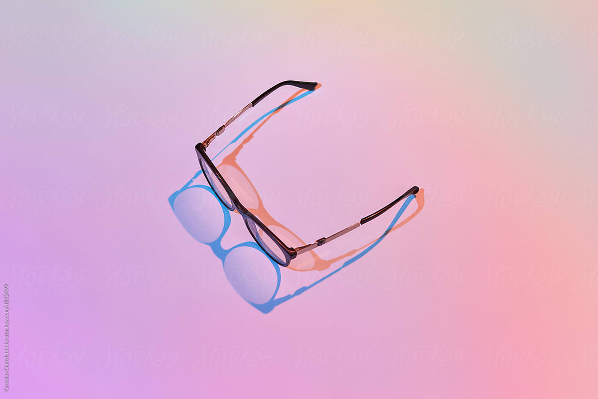 Stylish glasses with falling shadow.